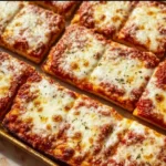 Delicious cheesy broccoli casserole baked with creamy cheese sauce and topped with breadcrumbs.