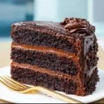 Decadent Death by Chocolate Cake with layers of rich chocolate frosting