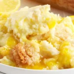 Deliciously baked Lemon Dump Cake topped with fresh citrus zest