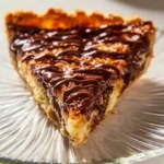 Samoas Cookie Pie with chocolate, caramel, and coconut toppings