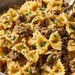 Delicious Garlic Butter Bowtie Pasta with Ground Beef served in a bowl
