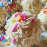 Delicious no-bake coconut cream Easter balls decorated for spring festivities.