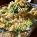 No-boil broccoli pasta bake dish topped with cheese and baked to perfection.