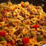 Delicious stuffed pepper pasta skillet dish served in a pan