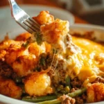 Delicious tater tot hamburger green bean casserole baked and ready to serve