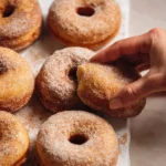 Homemade cinnamon sugar donuts freshly made and ready to enjoy.
