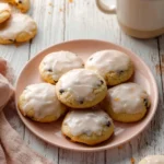 Freshly baked Orange Ricotta Cookies on a cooling rack