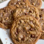 Brown butter espresso toffee chocolate chip cookies on a plate