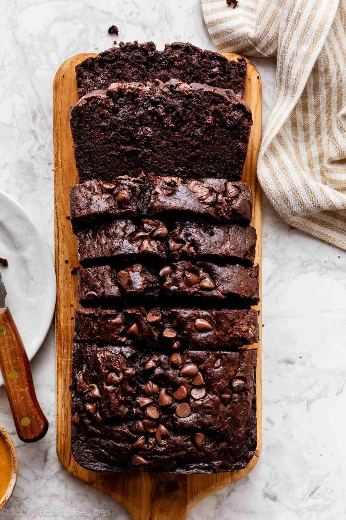 Slice of double chocolate banana bread with chocolate chips and bananas