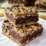 Delicious no bake chocolate oatmeal bars topped with chocolate drizzle.